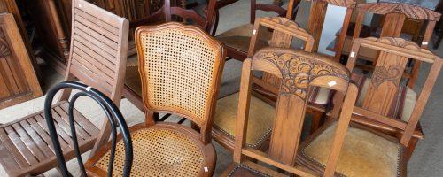 Old Chairs In A Thrift Shop